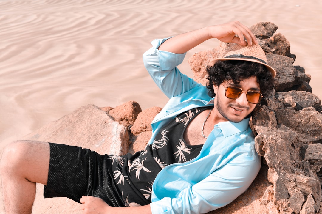 a person lying on a rock