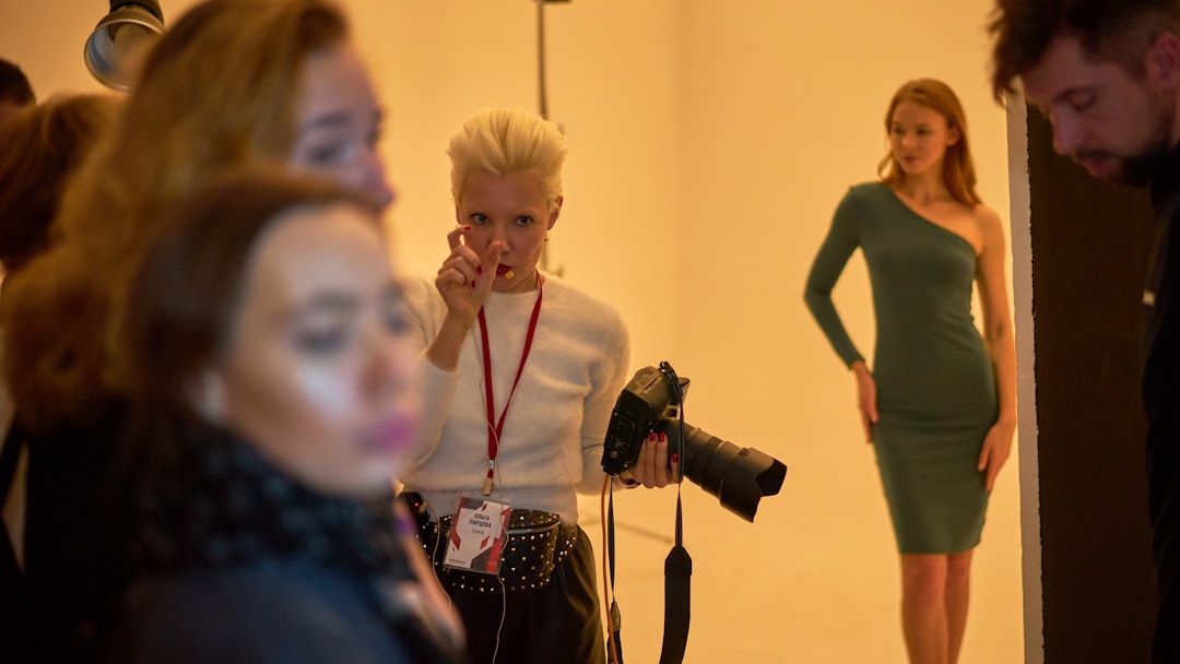 A group of people standing in a room
