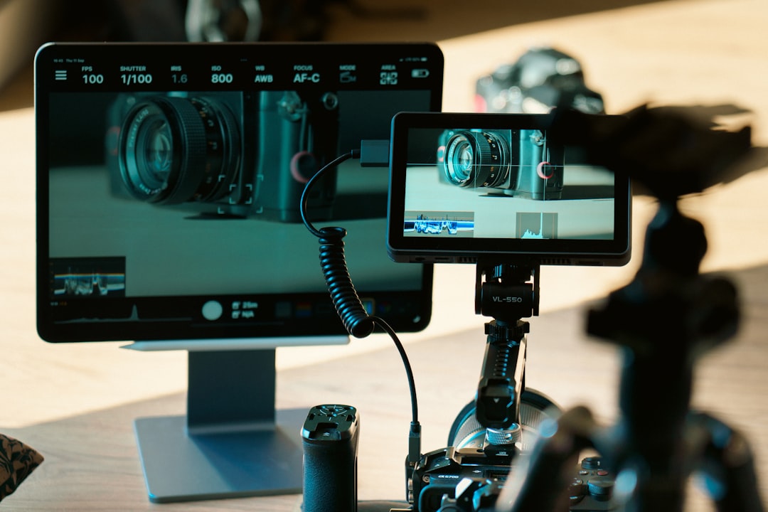 Camera setup with digital monitors displaying camera viewfinderscope